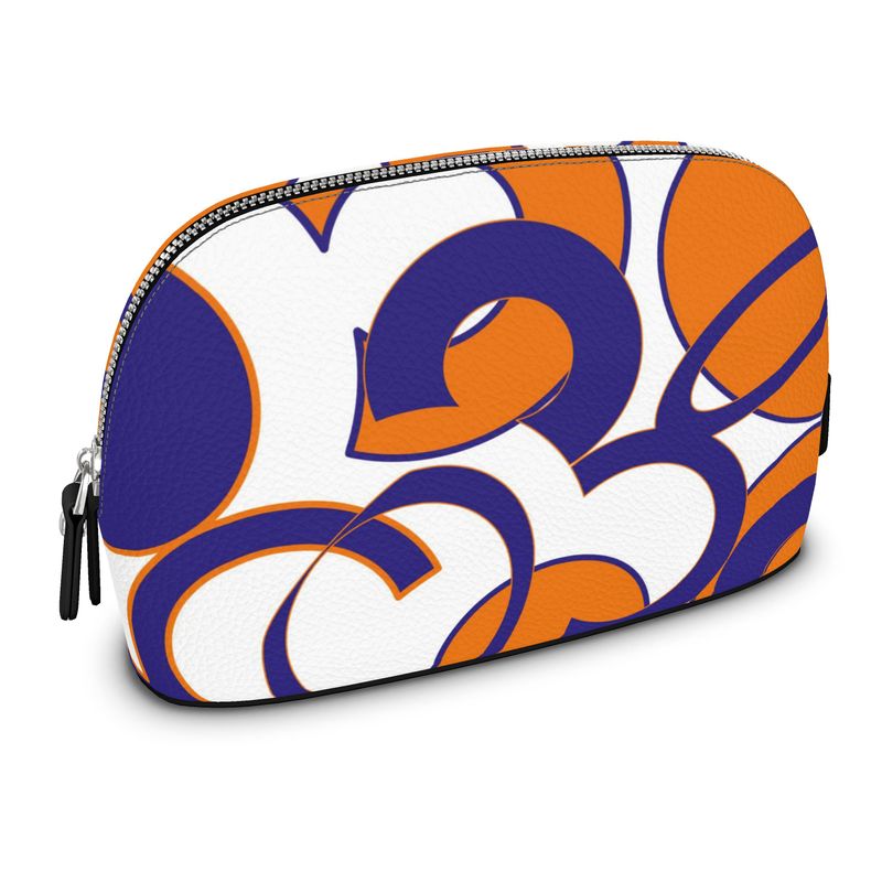 Eronie - custom designed washbag, bold colours of tangerine and Lapis Lazuli clashing in haphazard circles 